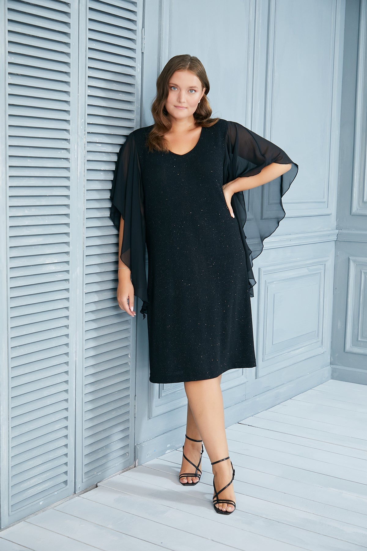 Plus size holiday dress with angel sleeves